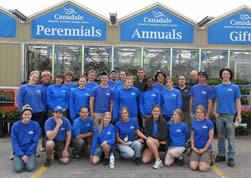 Group of employees standing out front of Canadale Nurseries Ltd.