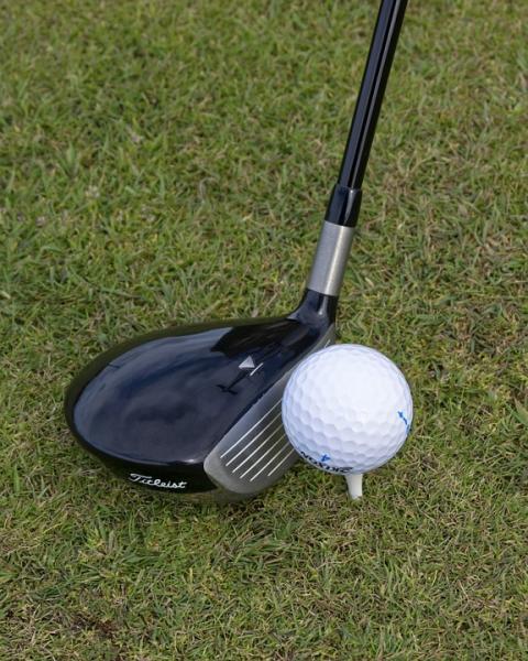 Close up driver and golf ball on tee 